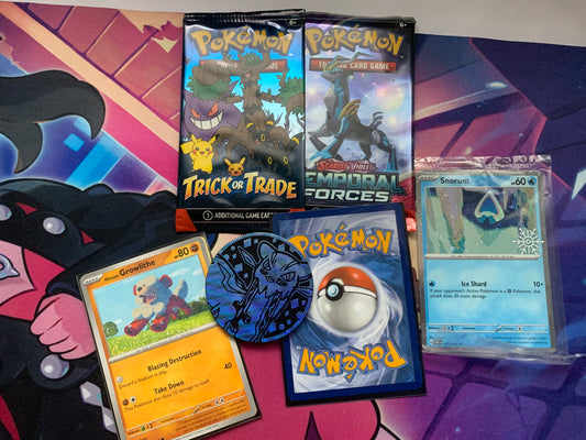 Bundle 2: 2 sealed Pokémon packs, 1 rare/sealed card, 5/4 bonus sleeved Pokémon cards,1 Pokémon coin